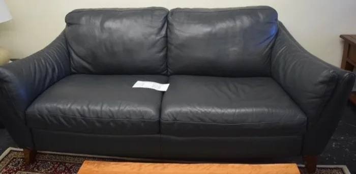 Natuzzi leather sofa at Elite Repeat Furniture Consignment